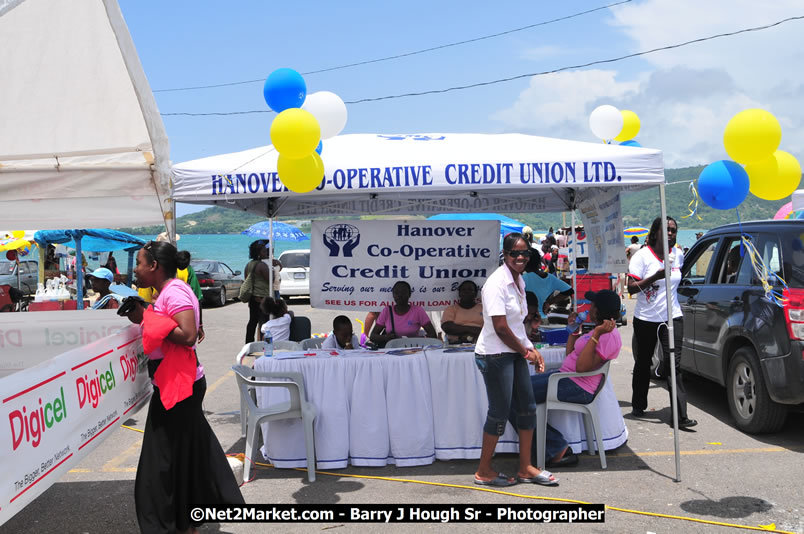 Lucea Cross the Harbour @ Lucea Car Park - All Day Event - Cross the Harbour Swim, Boat Rides, and Entertainment for the Family - Concert Featuring: Bushman, George Nooksl, Little Hero, Bushi One String, Dog Rice and many local Artists - Friday, August 1, 2008 - Lucea, Hanover Jamaica - Photographs by Net2Market.com - Barry J. Hough Sr. Photojournalist/Photograper - Photographs taken with a Nikon D300 - Negril Travel Guide, Negril Jamaica WI - http://www.negriltravelguide.com - info@negriltravelguide.com...!