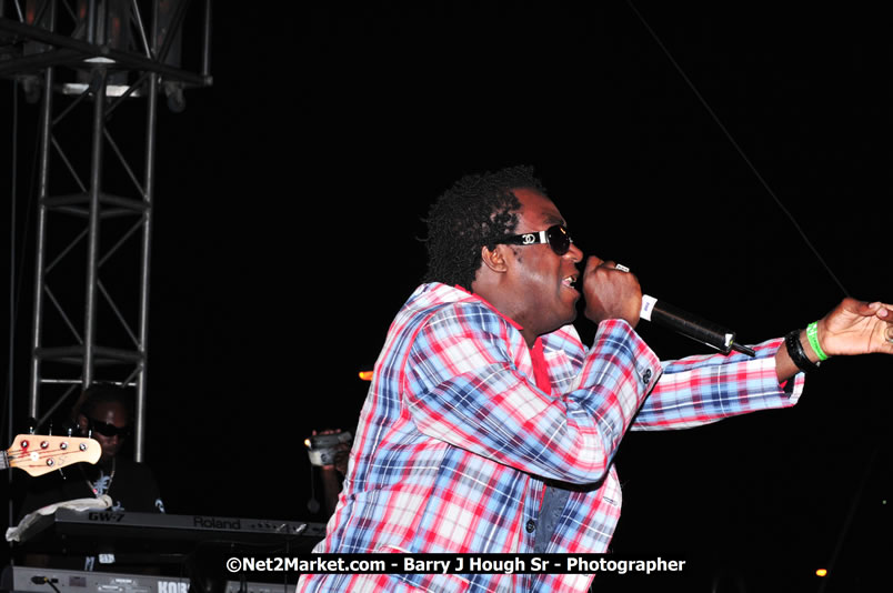 Lucea Cross the Harbour @ Lucea Car Park - All Day Event - Cross the Harbour Swim, Boat Rides, and Entertainment for the Family - Concert Featuring: Bushman, George Nooksl, Little Hero, Bushi One String, Dog Rice and many local Artists - Friday, August 1, 2008 - Lucea, Hanover Jamaica - Photographs by Net2Market.com - Barry J. Hough Sr. Photojournalist/Photograper - Photographs taken with a Nikon D300 - Negril Travel Guide, Negril Jamaica WI - http://www.negriltravelguide.com - info@negriltravelguide.com...!