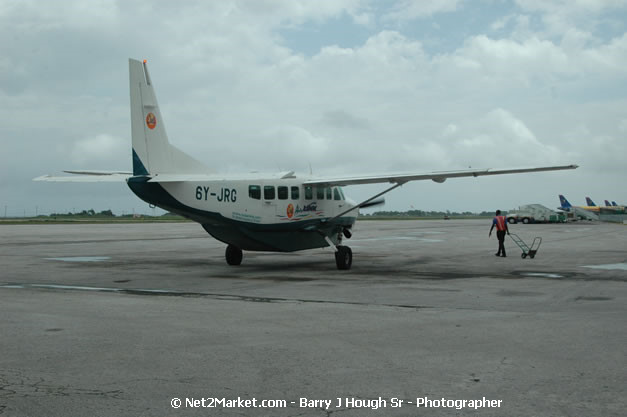 Intl. Airl Link - The Ultimate Connection - MBJ Airports Limited - Sangster International Airport - Domestic Terminal - Montego Bay, St James, Jamaica W.I. - MBJ Limited - Transforming Sangster International Airport into a world class facility - Photographs by Net2Market.com - Negril Travel Guide, Negril Jamaica WI - http://www.negriltravelguide.com - info@negriltravelguide.com...!